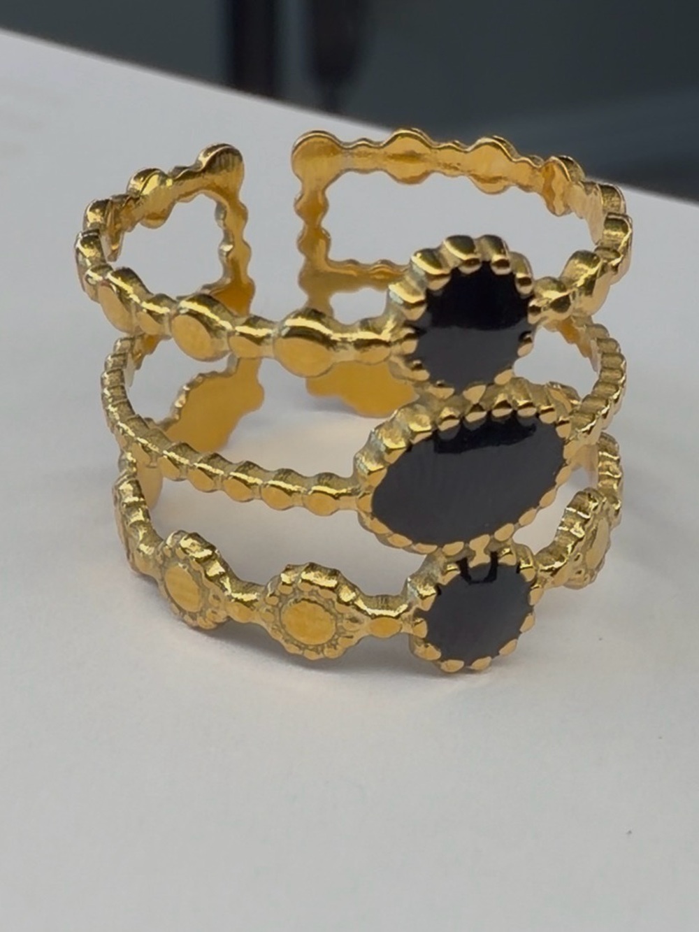 Plunder Gold Ring with Black Gem Accents